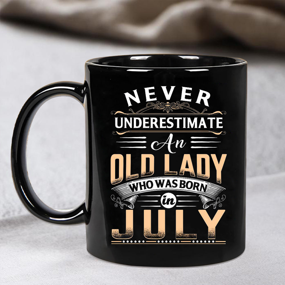 Never Underestimate An Old Lady - Coffee Mug